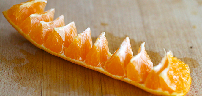 Peeling oranges